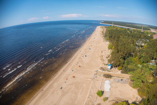 Estonia, narva j&otilde;esuu,.May 26, 2021 Coast of the Gulf of Finland, sandy coast.  Summer day, drone view of the resort town at the mouth of the Narva in the Baltic States