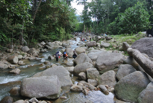 JERAM TOI, MALAYSIA -OCTOBER 22, 2020: Cozy atmosphere during the day at Jeram Toi Recreation Park in Malaysia. Visitors enjoy holidays and picnics with the family.