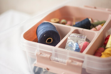 Obraz na płótnie Canvas Sewing box organizer. Sewing and sewing supplies