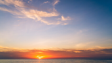 Naklejka premium sunset over the sea