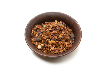 Chocolate granola cereal with nuts in a bowl background.