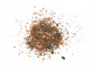 Aerial view of Variety of roasted seeds, flax, chia, sesame, sunflower seeds, pumpkin for healthy eating. Bulk seed mix on white background. Ecological and organic spices and food.