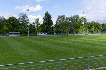 Fototapeta premium Fresh mowed football field at springtime. Photo taken May 27th, 2021, Zurich, Switzerland.