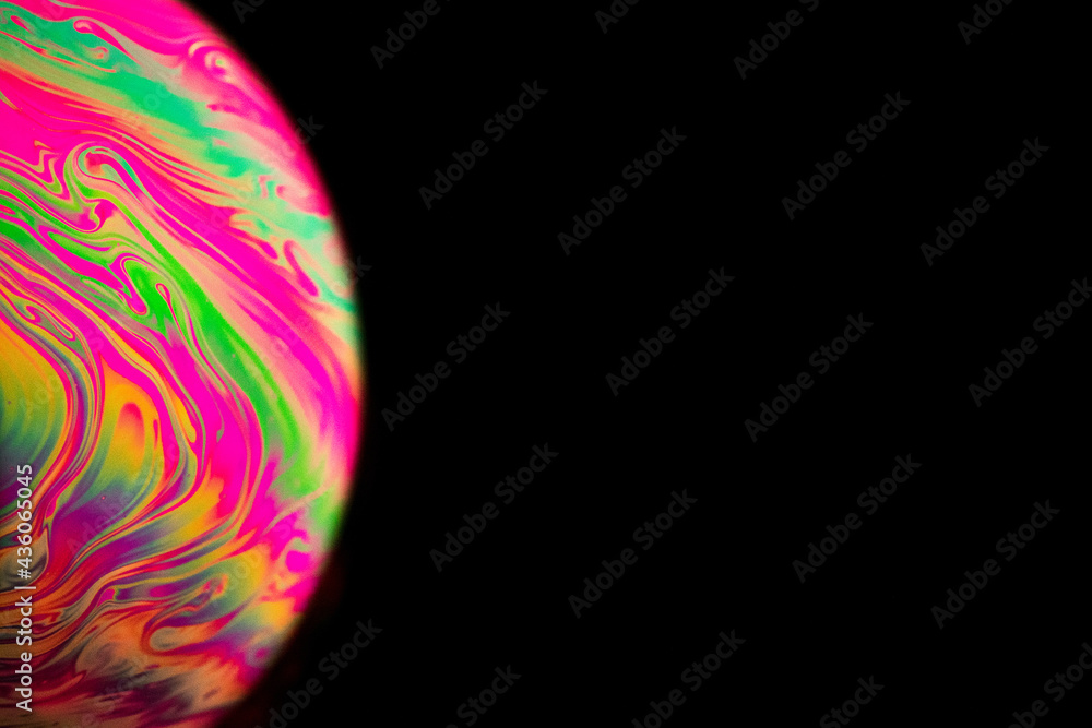 Wall mural bubbles macro. globe planet earth in galaxy universe space with abstract sun on black background. ma