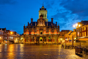 Naklejka na ściany i meble Delft Market Square Markt in the evening. Delfth, Netherlands