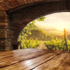 Desk of free space and vineyard background 