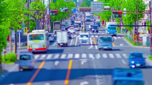 A timelapse of miniature traffic jam at the avenue tiltshift panning