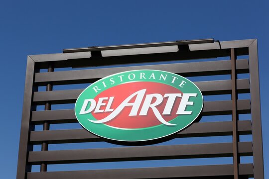 Villefranche, France - March 15, 2020: Pizza Del Arte logo on a building. Pizza Del Arte is a French chain created in 1984 and specializing in Italian specialties 