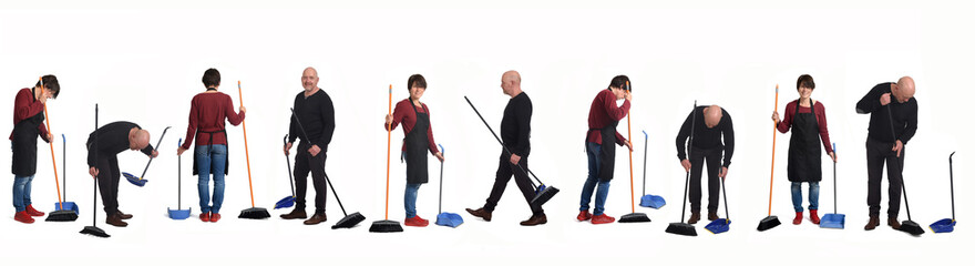woman and man with a broom and dustpan sweeping on white background
