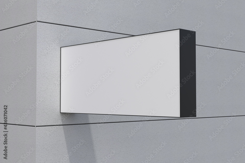 Poster closeup view of a blank rectangular shaped billboard with a white space attached to the wall