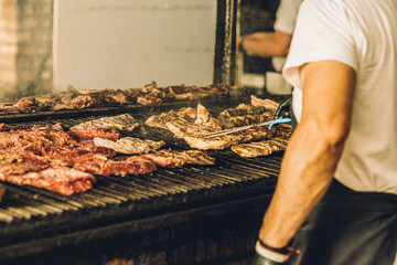 Chef Preparing Meat on the Grill
