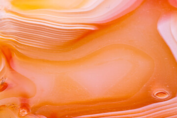 Macro mineral orange agate in crystals on white background