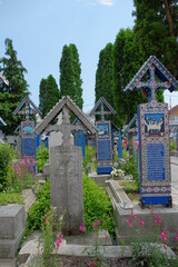 The Merry Cemetery is a cemetery in the village of Sapanta, Maramures county, Romania. In the Merry Cemetery, grave markers celebrate life with beautiful images and gentle wit.