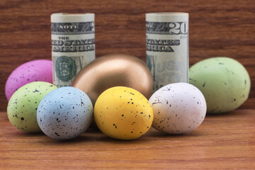 American investment symbolized with gold egg surrounded by colorful, diversified eggs