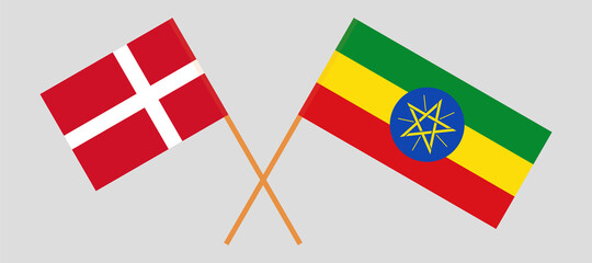 Crossed flags of Denmark and Ethiopia. Official colors. Correct proportion
