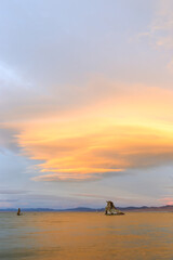 Fantastic colors over Mono Lake with lenticular clouds moving over it at a twilight