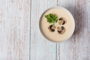 mushroom puree soup on a light background. mushroom mushroom soup with garlic