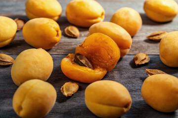Naklejka na ściany i meble apricots on a wooden table