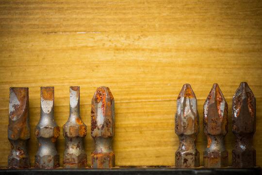 Used rusty screwdriver heads and bits