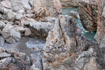 Mountain view of the sea and the beach. Beautiful beach by the mountain sea. Mountain blue lagoon...