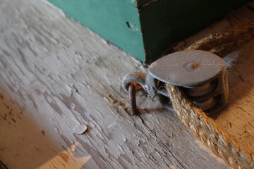 Block and tackle made of iron in an old wood shop on the chesapeake bay
