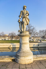 Fototapeta premium Two rings of statues at small canal in Padua Prato della Valle (Pra deła Vale) - largest square in Italy with a green island at center. Padova (Padua), Veneto, Italy.
