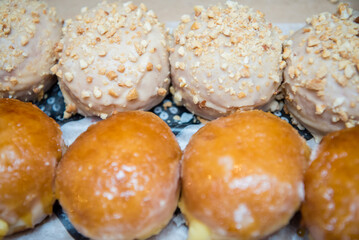 Donut holes in rows. Flat lay composition