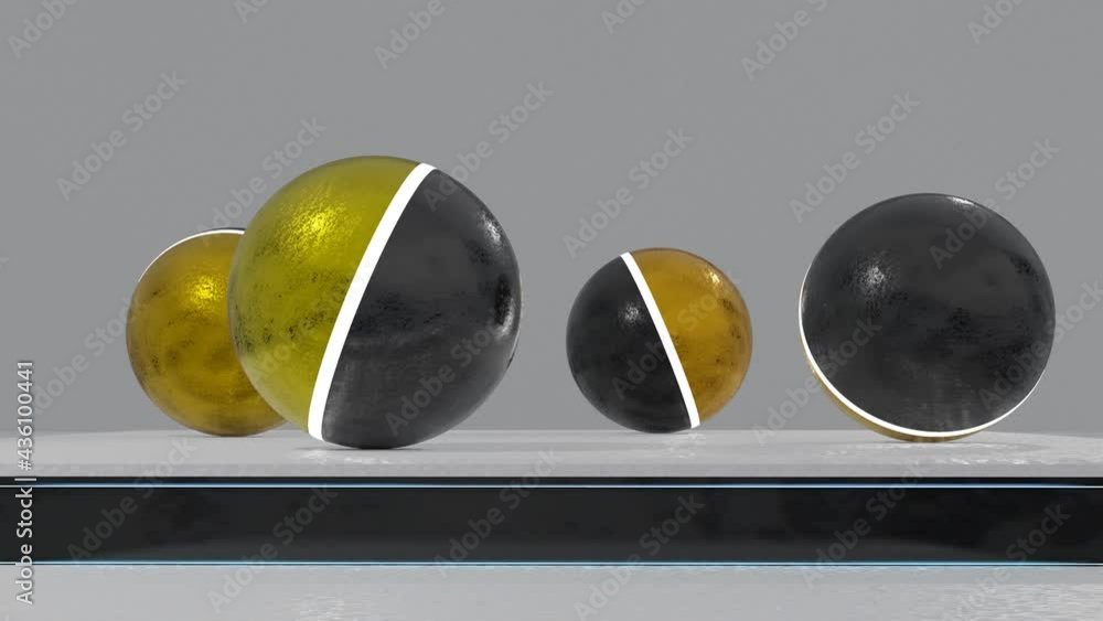 Poster two-tone black gold balls roll back and forth on the rough white surface. animated looping screensav