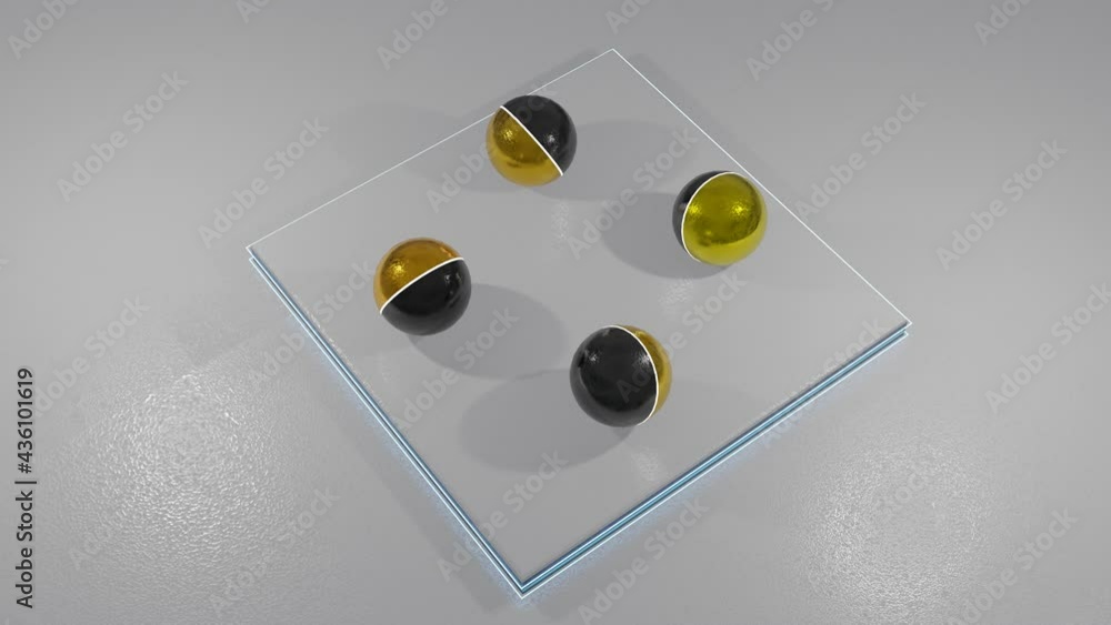 Poster two-tone black gold balls roll back and forth on the rough white surface. animated looping screensav