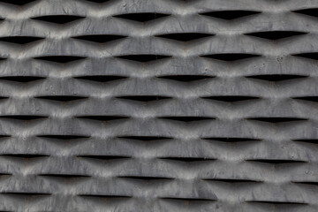 interesting background steel gray industrial coarse mesh in close-up