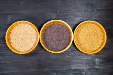 top view of white, black, yellow mustard seeds
