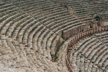 Ancient Roman amphitheater made of stone under the open sky in Pamukkale in Turkey