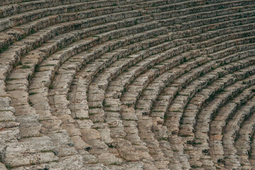 Ancient Roman amphitheater made of stone under the open sky in Pamukkale in Turkey