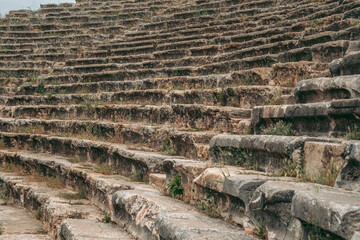 Ancient Roman amphitheater made of stone under the open sky in Pamukkale in Turkey
