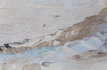 Carbonate mineral left by the flowing of thermal spring calcite-laden waters in Pamukkale