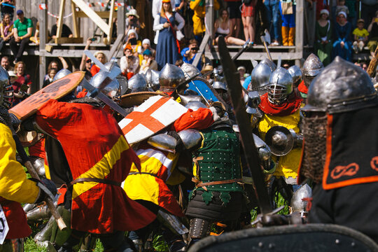 Battle of medieval knights on the battlefield, historical reconstruction
