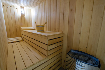 Fototapeta na wymiar New Finnish wooden sauna interior