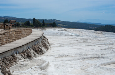 Fototapeta premium Carbonate mineral cliff with calcite-laden waters in Hierapolis Pamukkale in Turkey