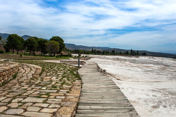 Fototapeta premium Carbonate mineral cliff with calcite-laden waters in Hierapolis Pamukkale in Turkey