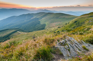 Panorama from the top of Tarnica to the peaks of Szeroki Wierch, Połonina Caryńska, Wetlińska and Wielka Rawka, the highest peaks of the Bieszczady Mountains, sunset of the Bieszczady Mountains, 