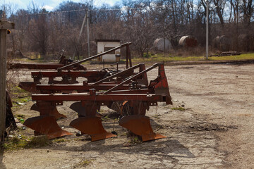 Devastation and decline in the agro-industrial sector. Cemetery of old rusty agricultural...