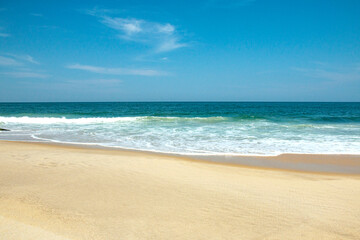 Fototapeta na wymiar Sea sand sky concept. Wonderful scenery of the tropical beach. Summer vacation.