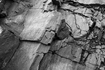 Stone texture, background layers and cracks in sedimentary rock on the rock, abstract background.
