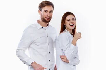 cheerful employees gesturing with their hands to work light background shirt communication model