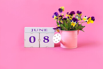 Calendar for June 8 : the name of the month of June in English, cubes with the numbers 0 and 8, a...