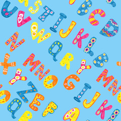 Pattern with bright colored letters of the English alphabet on a blue background