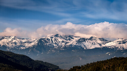 Cloud blanket hanging over the mountains just north of Whistler in the Garibaldi Mountain Range of British Columbia, Canada