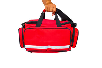 Hand hold red Emergency nurse bag  isolated on white background.