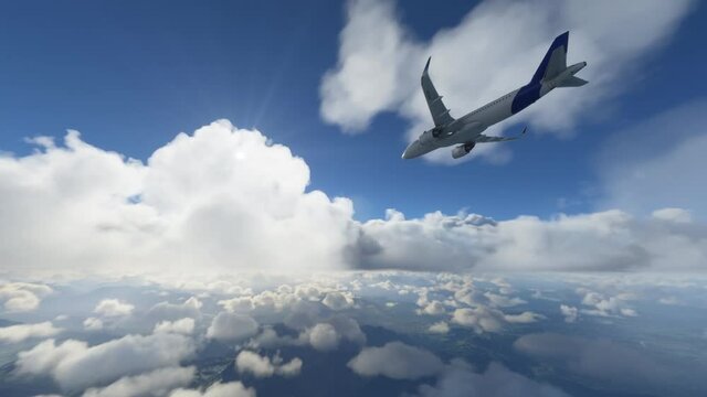Commercial plane flying through clouds over terrain with the sun shining in the sky. Cargo airplane having air turbulence