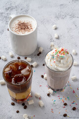 Coffee shop menu, drinks photoshoot on light stone table, morning atmosphere